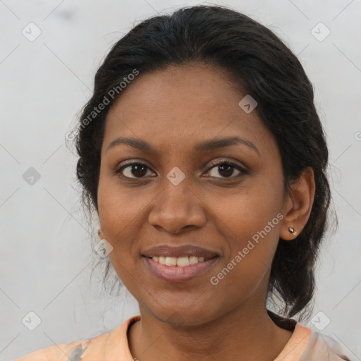 Joyful black young-adult female with medium  brown hair and brown eyes