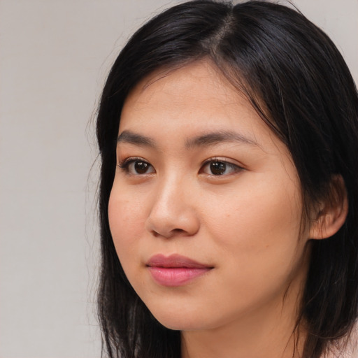 Neutral asian young-adult female with long  brown hair and brown eyes