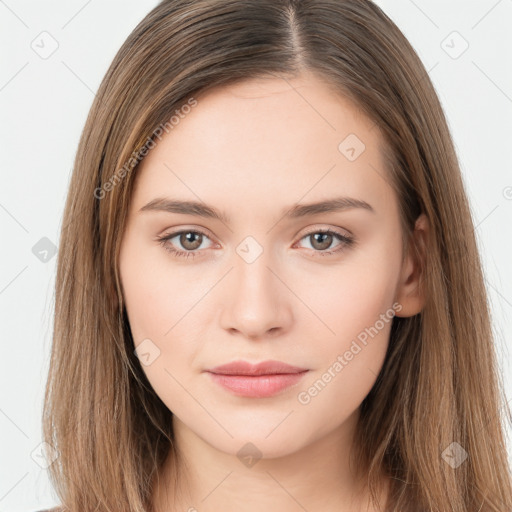 Neutral white young-adult female with long  brown hair and brown eyes