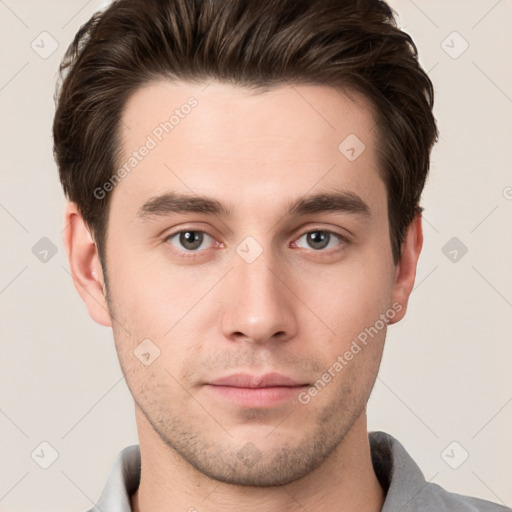 Neutral white young-adult male with short  brown hair and brown eyes