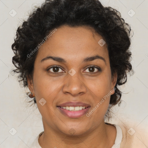 Joyful black adult female with short  brown hair and brown eyes