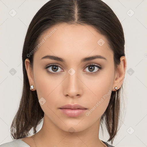 Neutral white young-adult female with long  brown hair and brown eyes