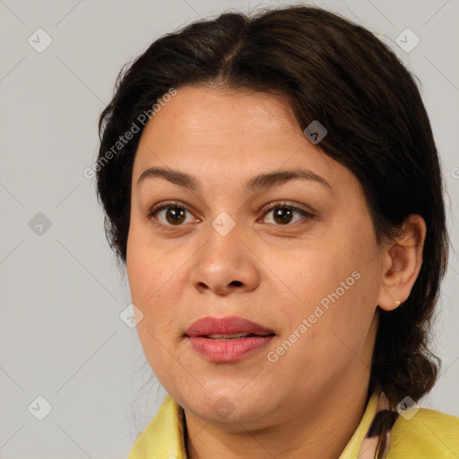 Joyful white adult female with medium  brown hair and brown eyes