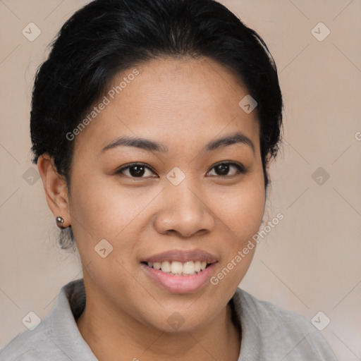 Joyful latino young-adult female with short  black hair and brown eyes