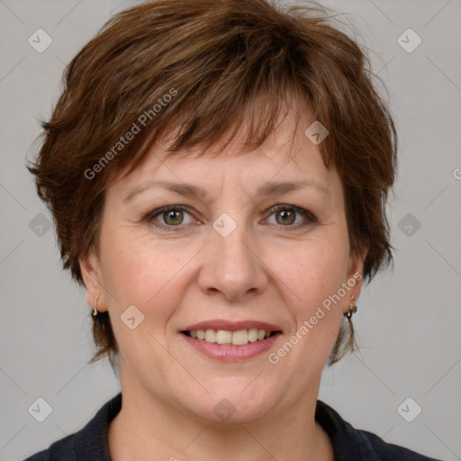 Joyful white adult female with medium  brown hair and grey eyes