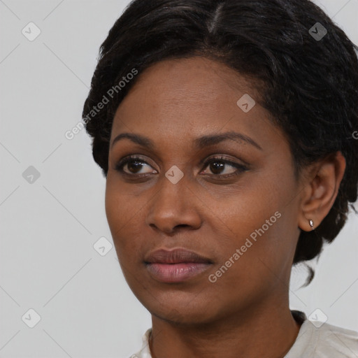 Neutral black young-adult female with short  black hair and brown eyes