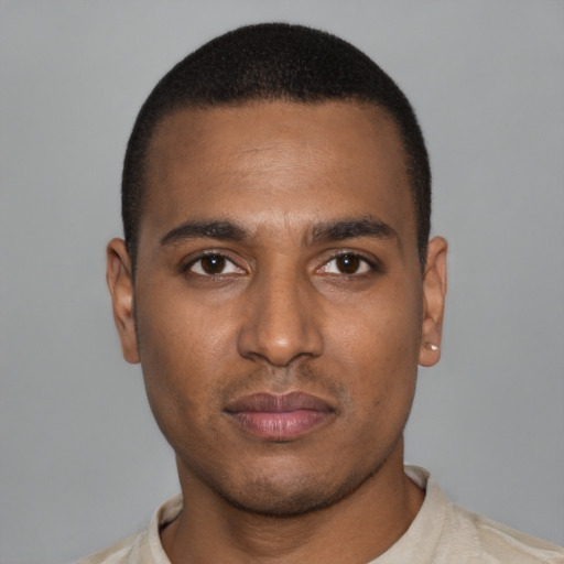 Neutral black young-adult male with short  black hair and brown eyes
