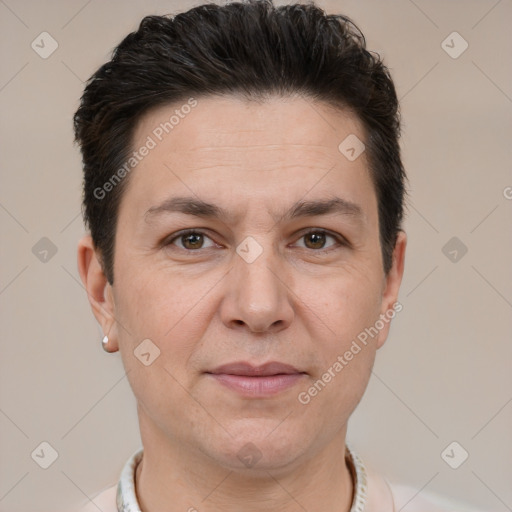 Joyful white adult female with short  brown hair and brown eyes