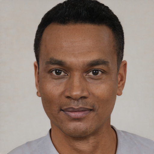 Neutral black young-adult male with short  black hair and brown eyes