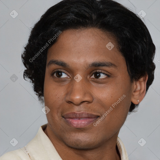 Joyful latino young-adult male with short  brown hair and brown eyes