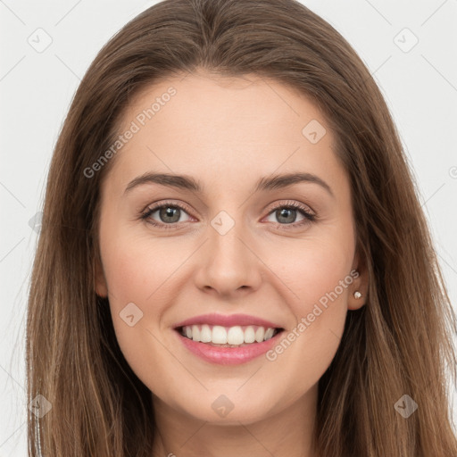 Joyful white young-adult female with long  brown hair and grey eyes