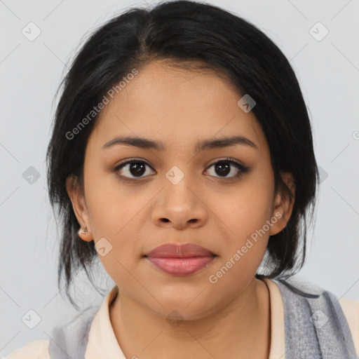 Joyful asian young-adult female with medium  black hair and brown eyes