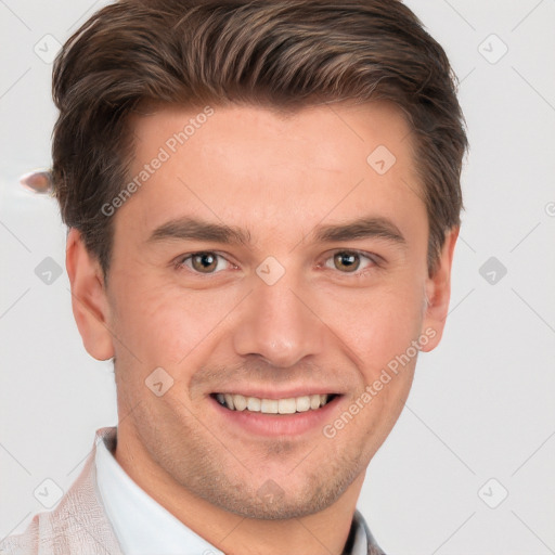 Joyful white young-adult male with short  brown hair and grey eyes