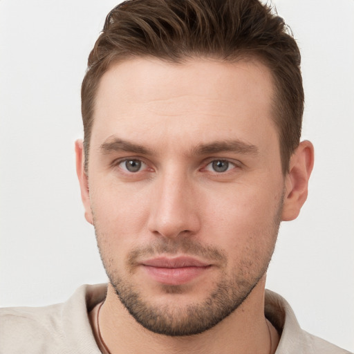 Neutral white young-adult male with short  brown hair and grey eyes