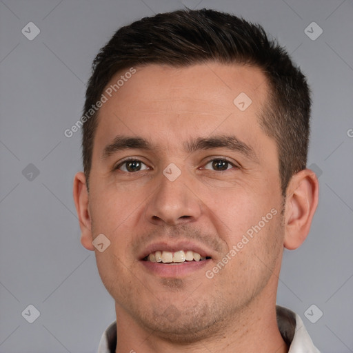 Joyful white young-adult male with short  brown hair and brown eyes