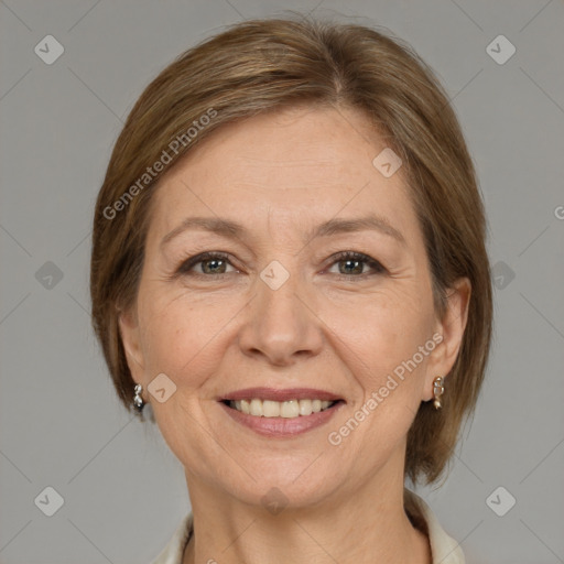 Joyful white adult female with medium  brown hair and grey eyes