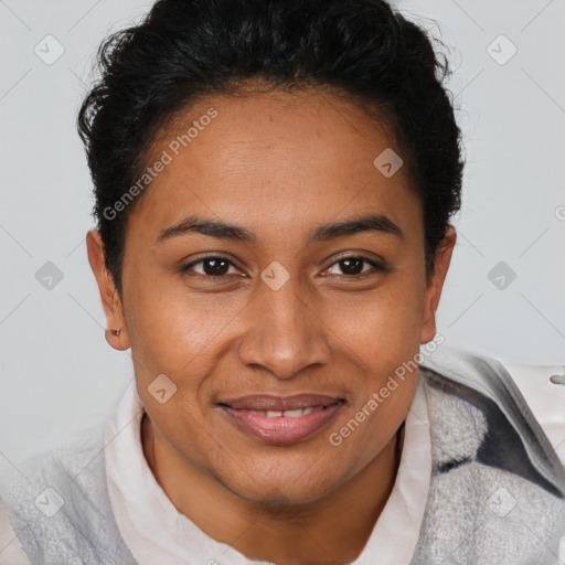 Joyful latino young-adult female with short  brown hair and brown eyes