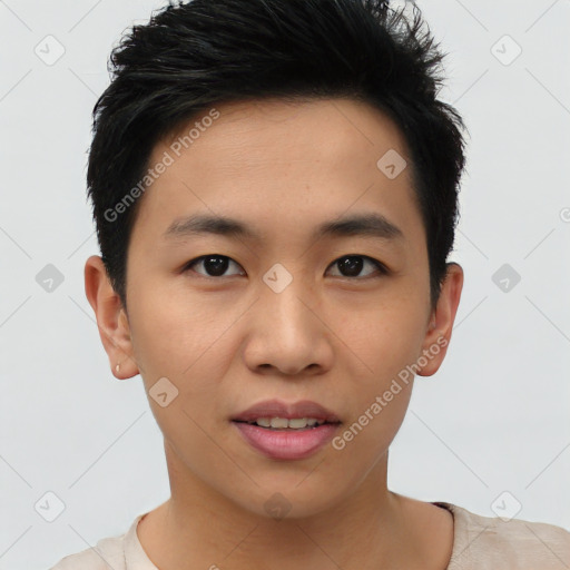 Joyful asian young-adult male with short  black hair and brown eyes