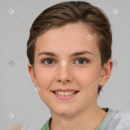 Joyful white young-adult female with short  brown hair and grey eyes