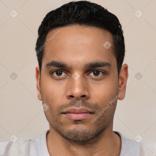 Neutral latino young-adult male with short  black hair and brown eyes