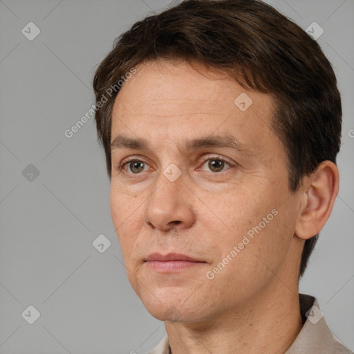 Neutral white adult male with short  brown hair and brown eyes