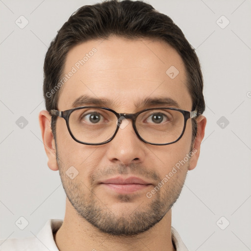 Joyful white young-adult male with short  brown hair and brown eyes