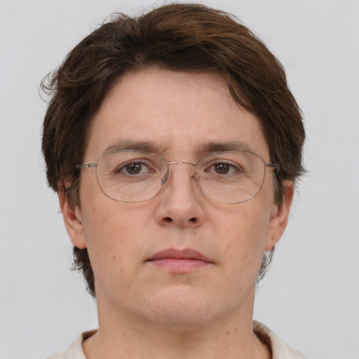 Neutral white adult female with short  brown hair and brown eyes