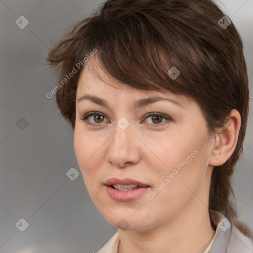 Joyful white adult female with medium  brown hair and brown eyes