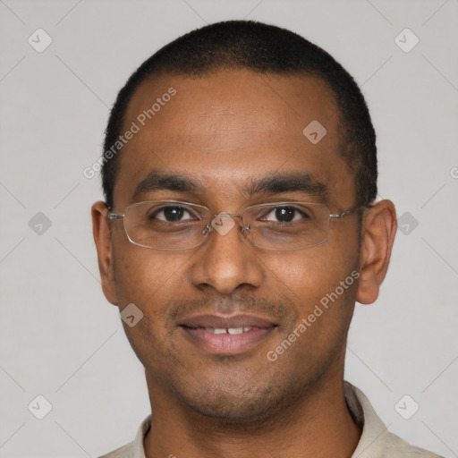Joyful latino young-adult male with short  brown hair and brown eyes