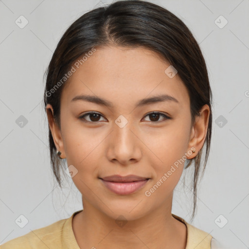 Joyful latino young-adult female with medium  brown hair and brown eyes