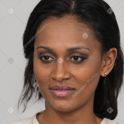 Joyful black young-adult female with medium  brown hair and brown eyes