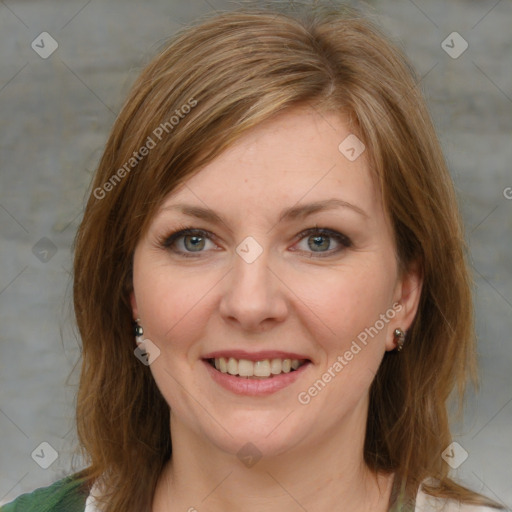 Joyful white young-adult female with medium  brown hair and blue eyes