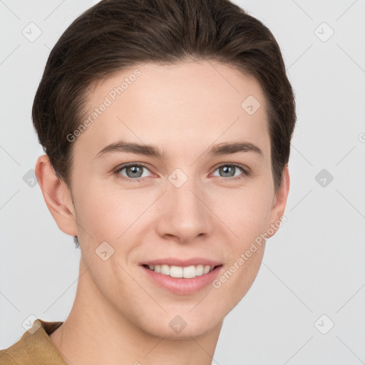 Joyful white young-adult female with short  brown hair and grey eyes