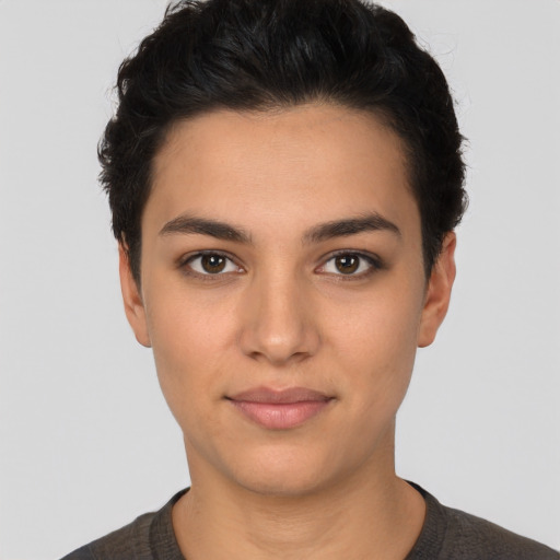 Neutral latino young-adult female with short  black hair and brown eyes