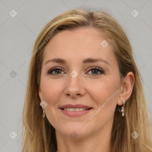 Joyful white adult female with long  brown hair and brown eyes