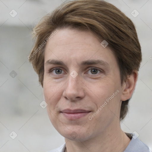 Joyful white adult female with short  brown hair and brown eyes