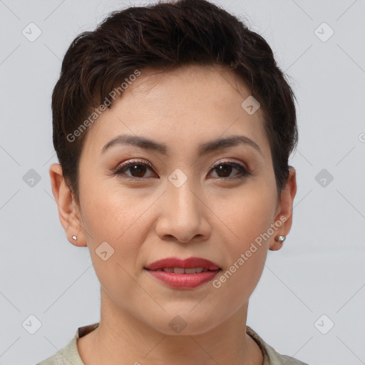 Joyful asian young-adult female with short  brown hair and brown eyes