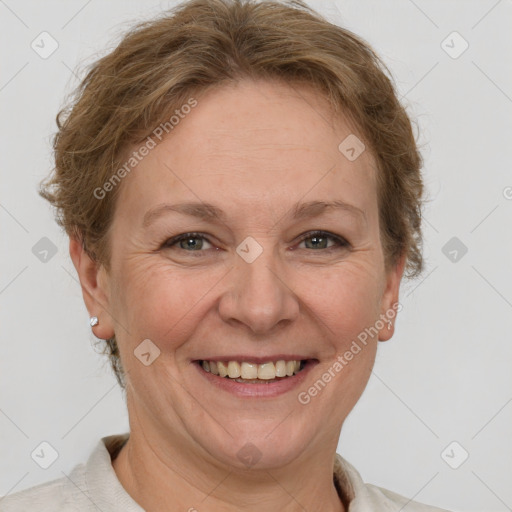 Joyful white adult female with short  brown hair and brown eyes