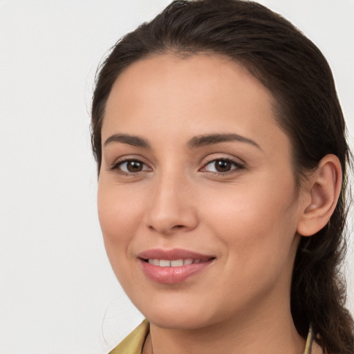 Joyful white young-adult female with medium  brown hair and brown eyes