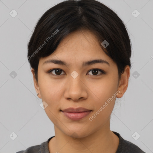 Joyful asian young-adult female with medium  black hair and brown eyes