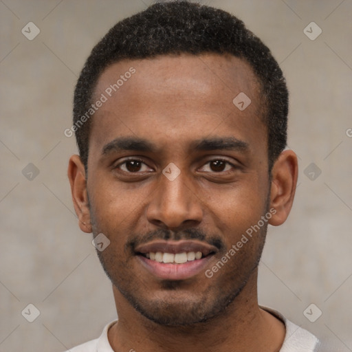 Joyful black young-adult male with short  black hair and brown eyes