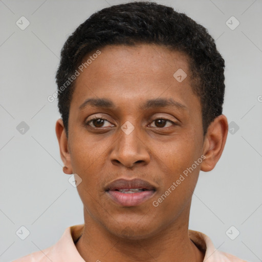 Joyful latino young-adult male with short  brown hair and brown eyes