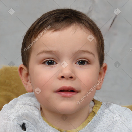 Joyful white child male with short  brown hair and brown eyes