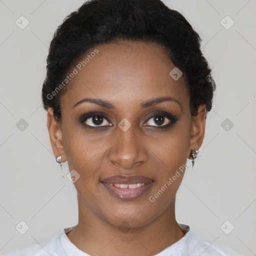 Joyful black young-adult female with short  brown hair and brown eyes