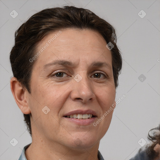 Joyful white adult female with short  brown hair and brown eyes