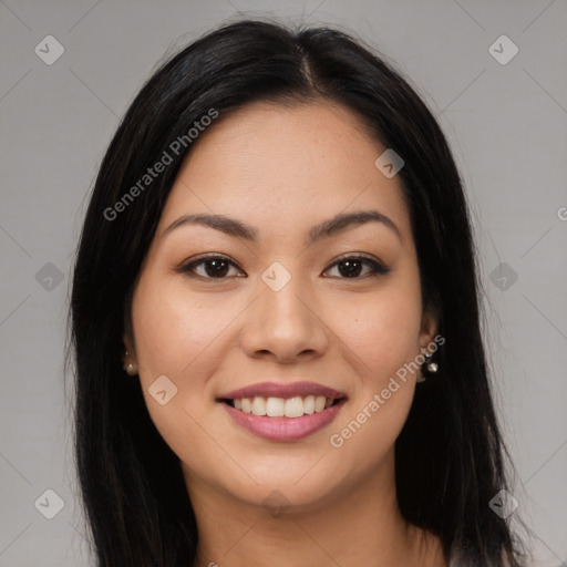 Joyful latino young-adult female with long  brown hair and brown eyes