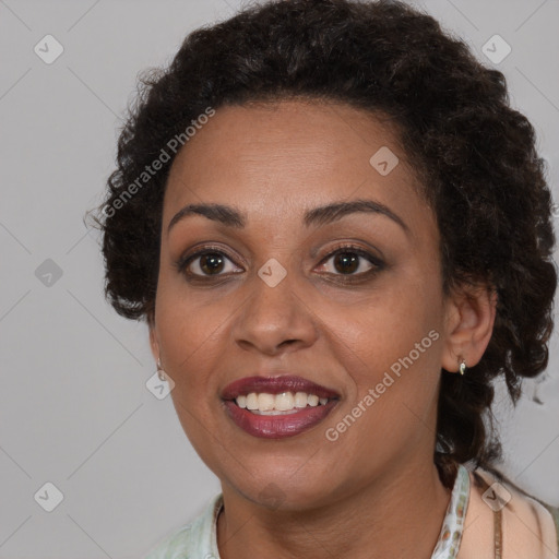 Joyful black young-adult female with medium  brown hair and brown eyes