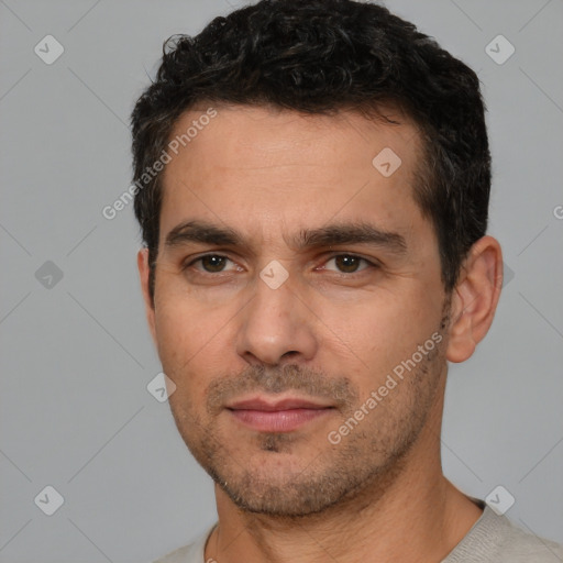 Neutral white adult male with short  black hair and brown eyes