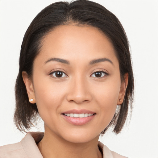 Joyful white young-adult female with medium  brown hair and brown eyes