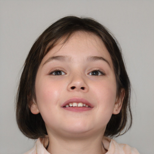 Joyful white child female with medium  brown hair and brown eyes